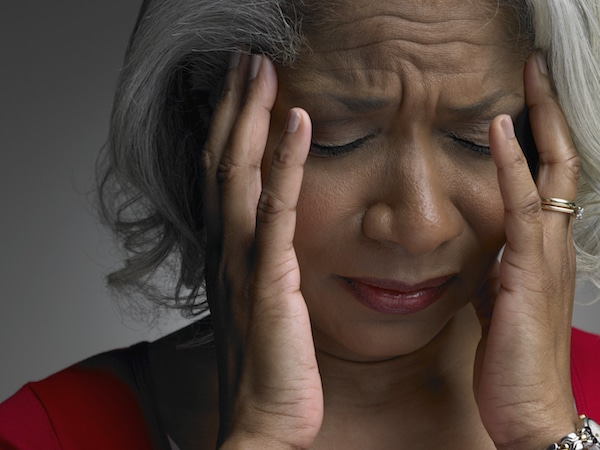 Woman suffering from a dizzy spell